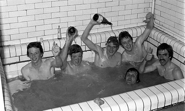 Liverpool players celebrate in the bath